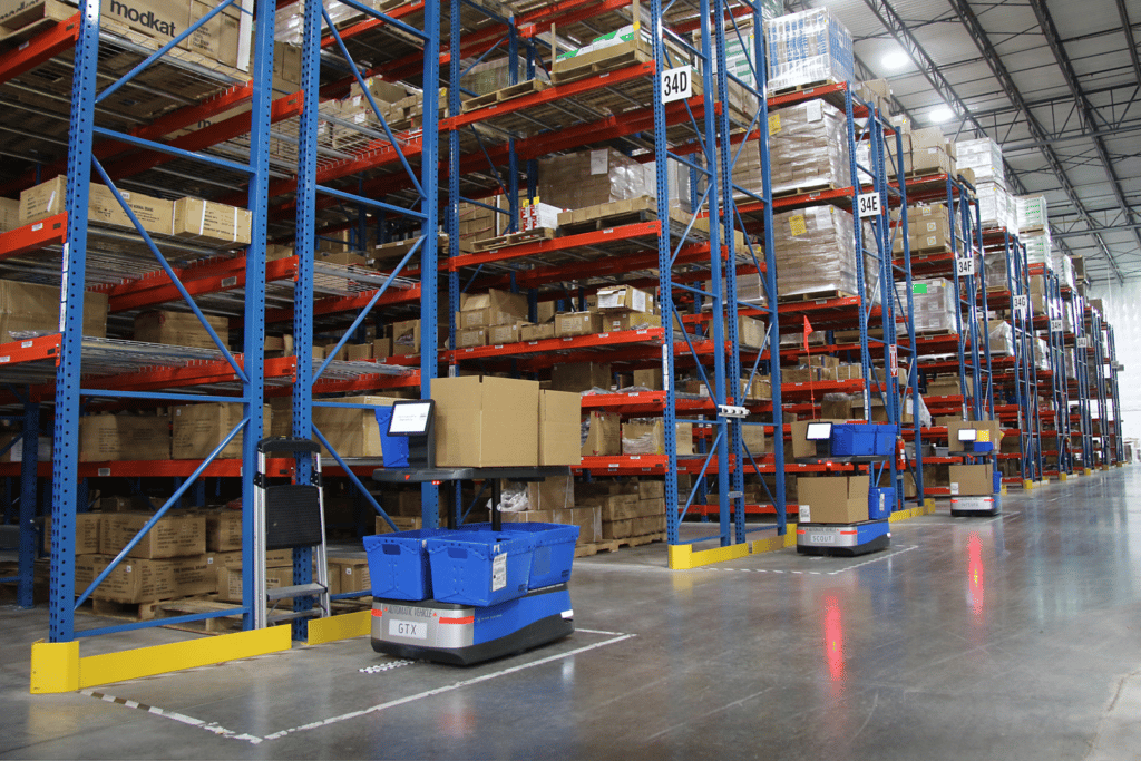 Robot in Distribution Center with boxes