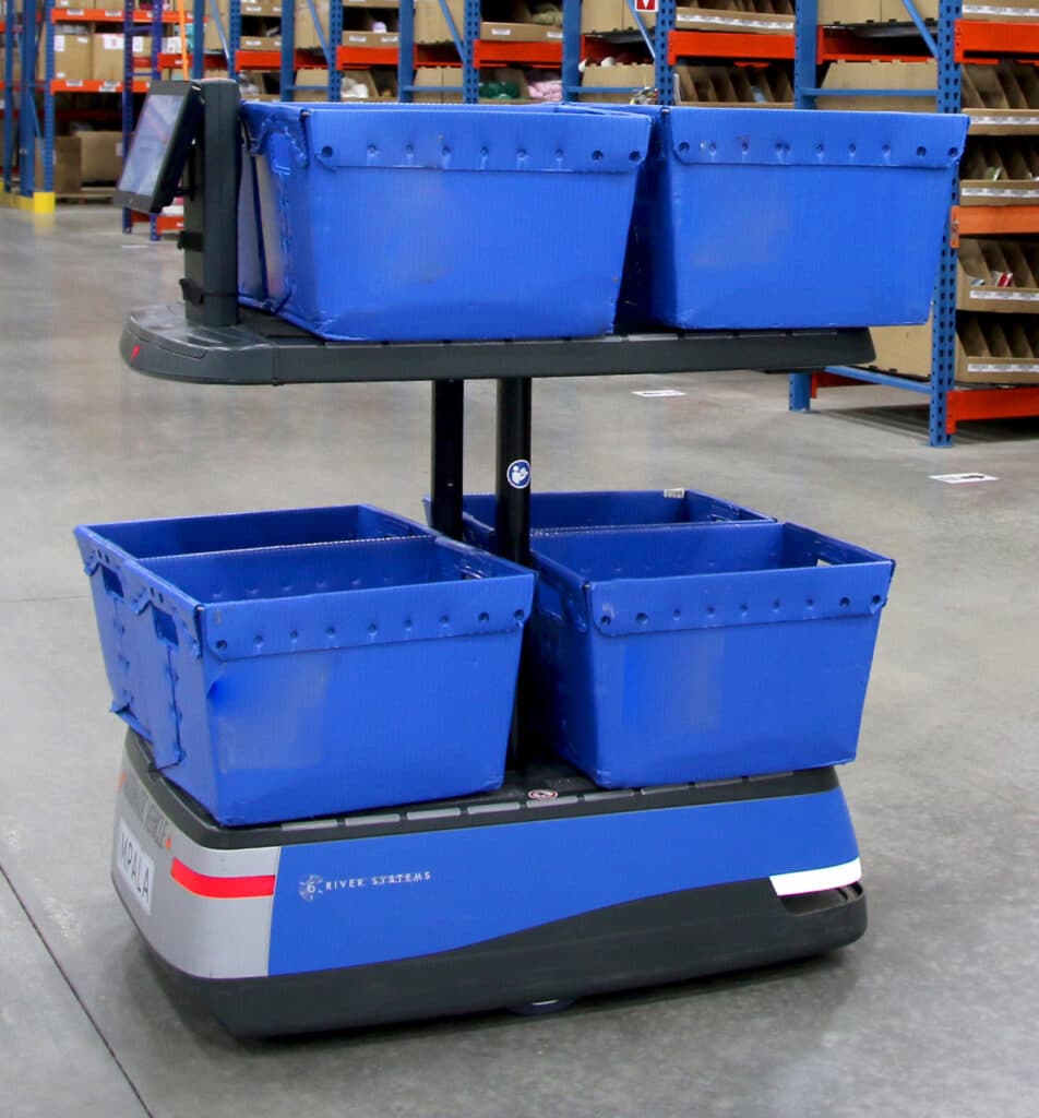 Robot with blue boxes in fulfillment services warehouse at Distribution Management